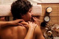 the-young-man-on-spa-treatment-recreation-rest-relaxation-and-massage-hygh-angle-view